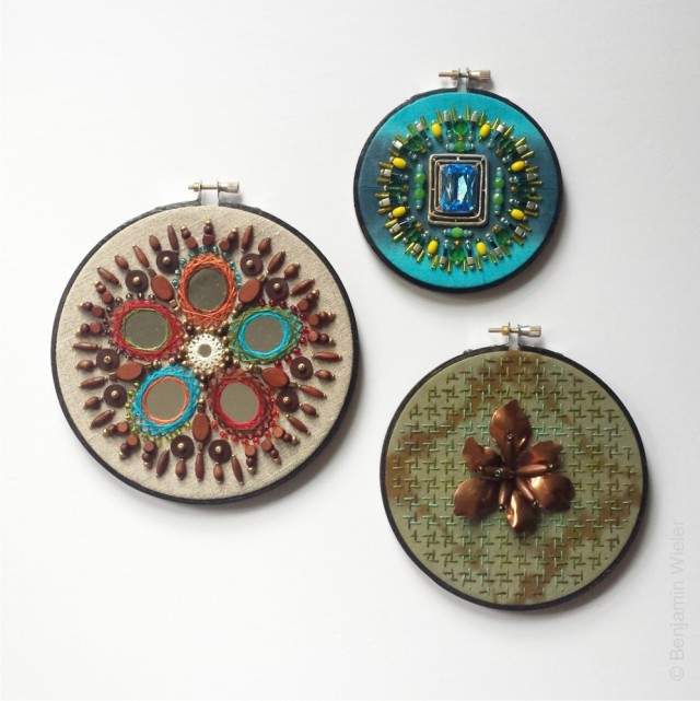 Benjamin Wieler, 2015, embroideries with beads, mirrors and vintage jewellery pieces. The largest with mirror embroidery on linen. The turquoise blue is shibori dyed cotton. The cotton blend olive is hand bleached shibori style featuring sashiko stitching & a raw vintage copper floral centre.